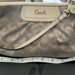 Cream Coach wristlet